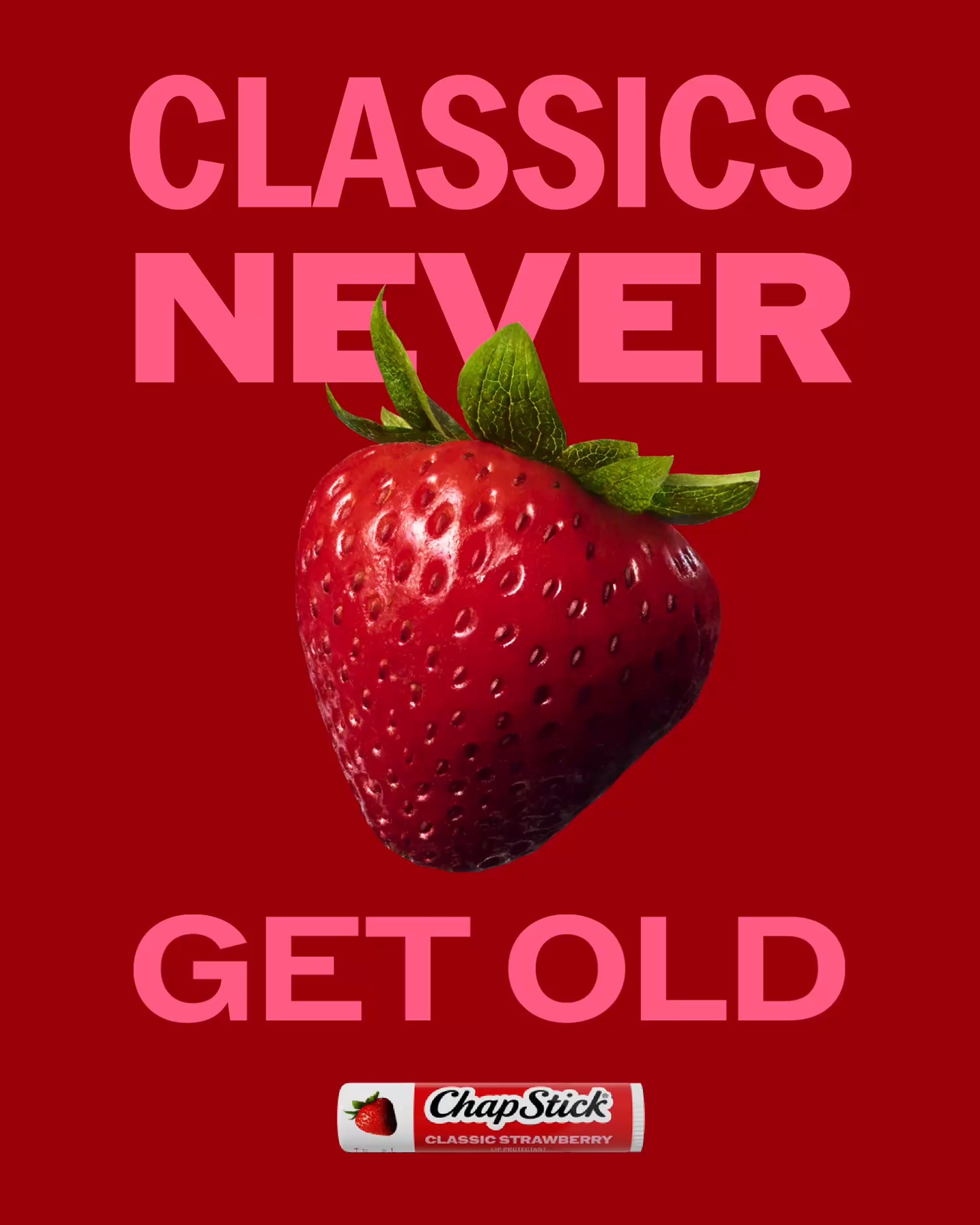 Poster with the headline "Classics never get old" in pink type around a large strawberry, a ChapStick Classic Strawberry tube below