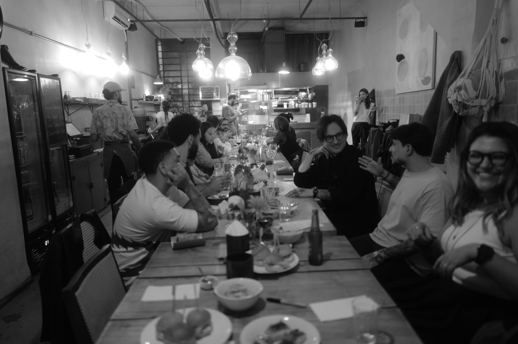 The team at one long table, Sao Paulo